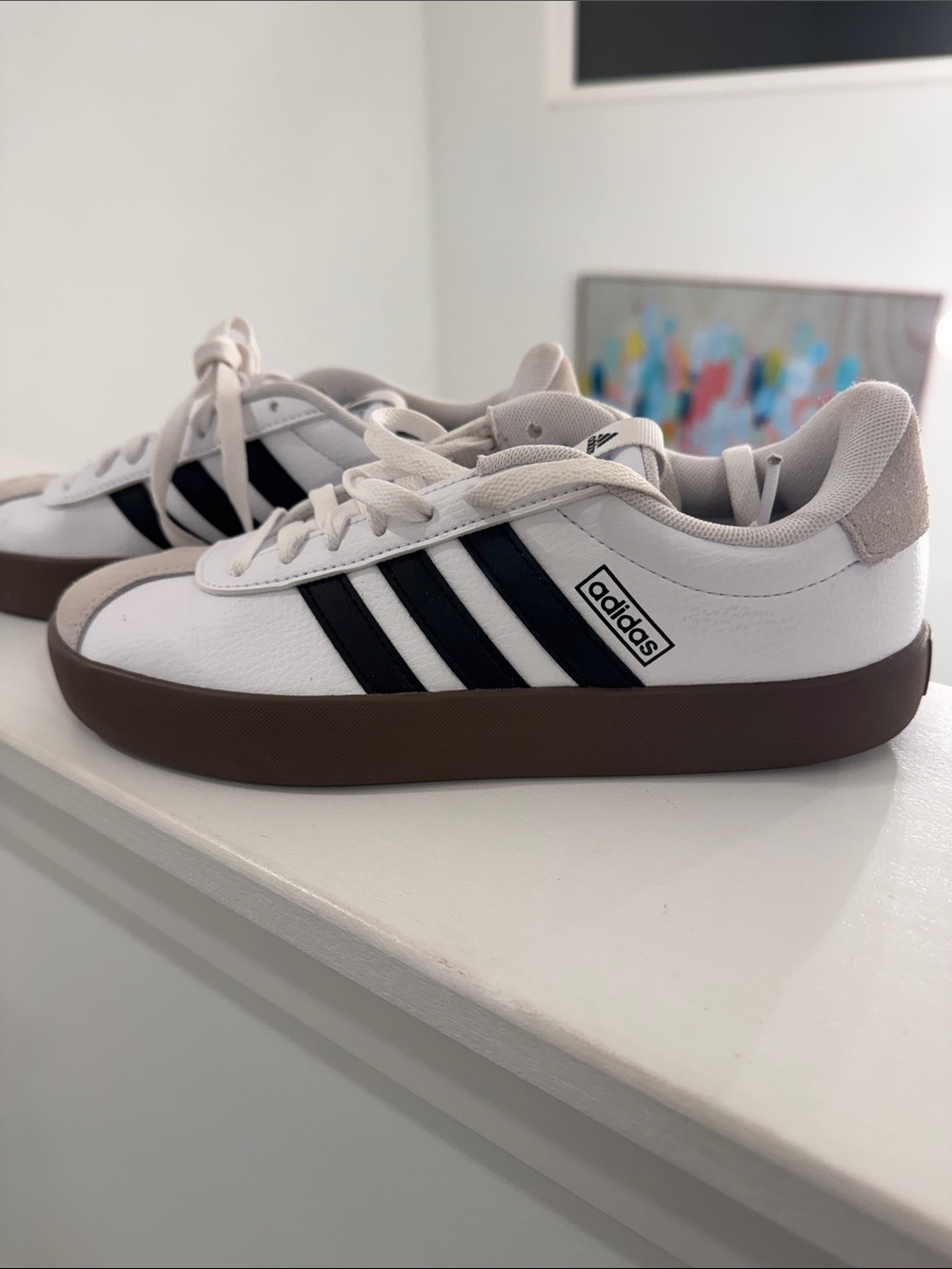 adidas Women’s White Sneakers with Black Stripes and Brown Sole